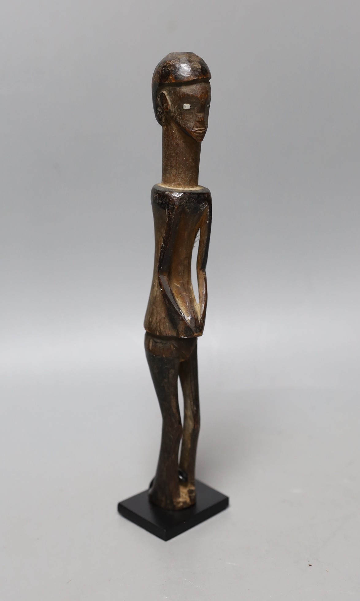 A West African figural carving on stand, 25cm excl stand